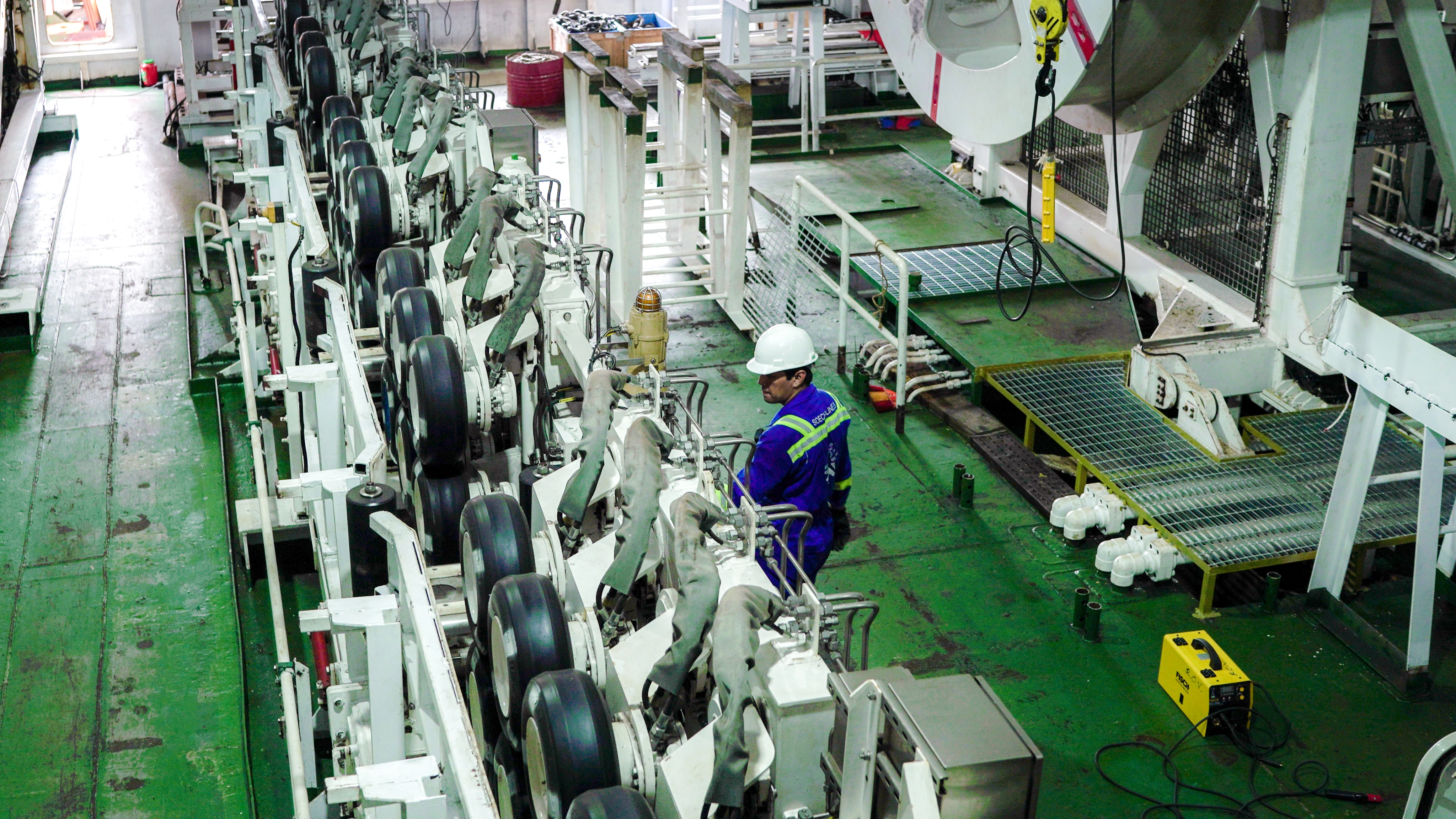 Cable-laying vessel operations with specialized maritime equipment